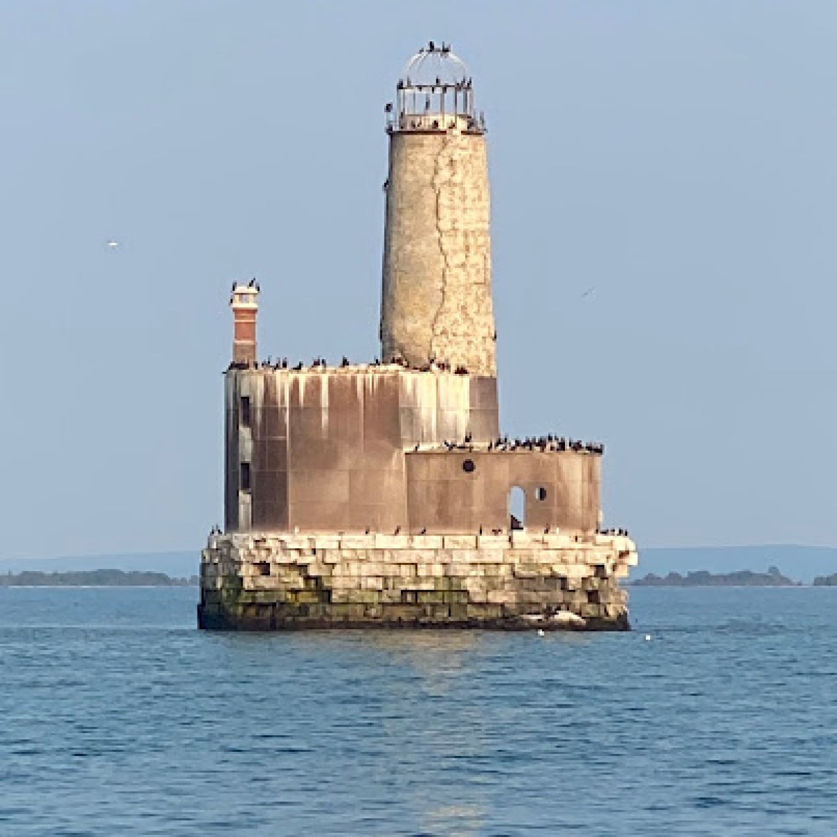 a large ship in the middle of a body of water